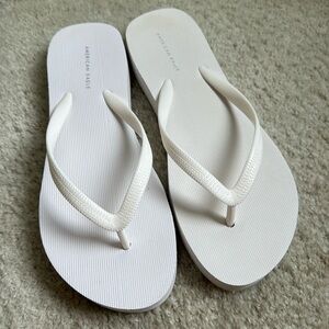 American Eagle Outfitters white flip flops
